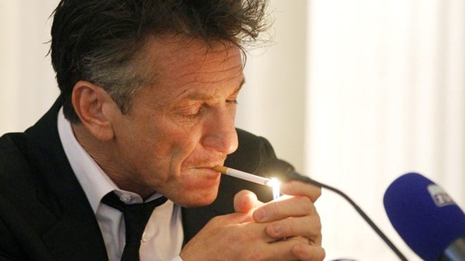 sean penn lights up_092811